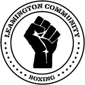 Illustrated clenched fist in a circle with text wrapped around &#039;Leamington Community Boxing&#039;